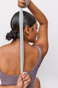 Woman exercising with a stretch band