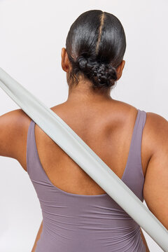 Woman exercising with a stretch band