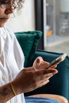closeup of female hands typing message on smartphone, communication