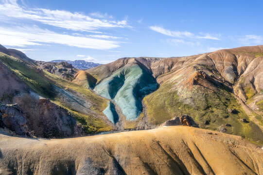 Colorful rhyolite valley with teal mineral hills, Landmannalaugar