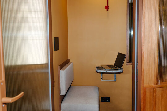Compact Office Booth with Laptop on Small Work Table
