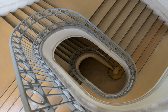 Spiral Staircase with Soft Beige Geometry