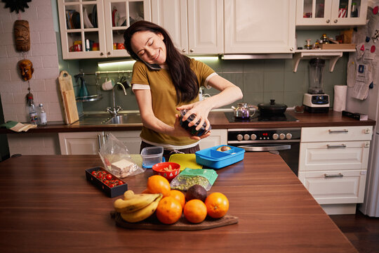 Cooking meal prep in modern kitchen with fresh ingredients