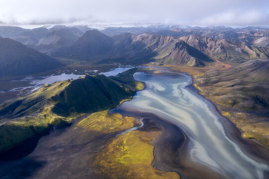 Glacial river flowing into highland lake, Landmannalaugar Iceland