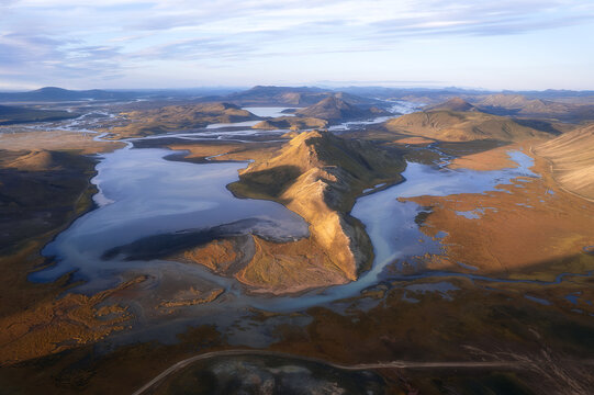 Golden hour over volcanic peninsula and highland lakes, Iceland