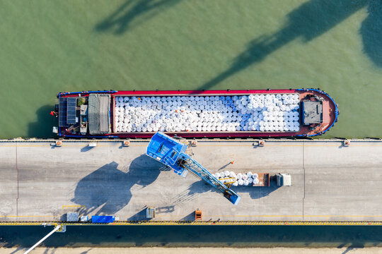 Cargo ship loading at port