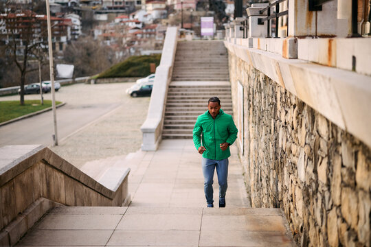 Black Man Jogging/Training Outdoors. Runner.