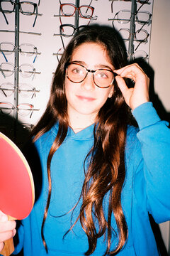 Girl trying glasses