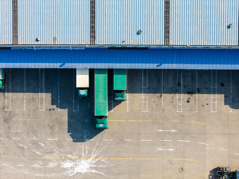 Trucks at warehouse loading dock