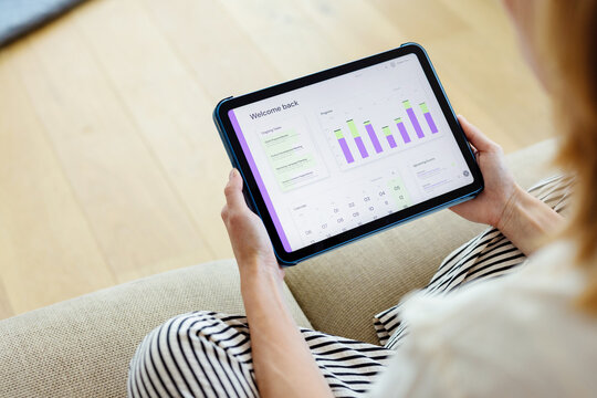 Business Dashboard on Tablet for Remote Work and Analytics