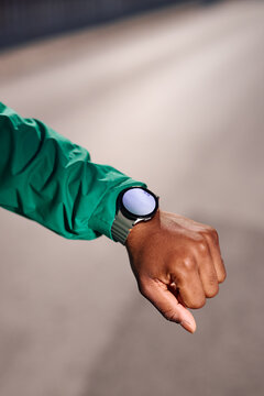 Black Man Checking Smartwatch 