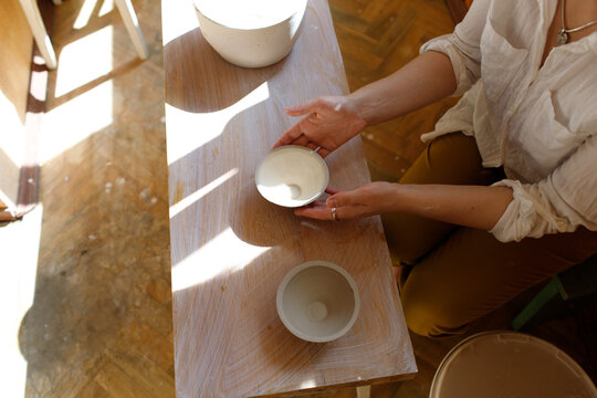 woman working with clay