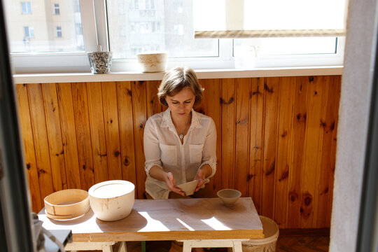 woman working with clay