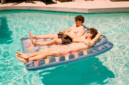 Men Drinking in the Pool