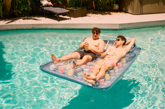 Men Drinking in the Pool