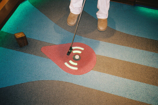Mini Golf Player  putter shot on film