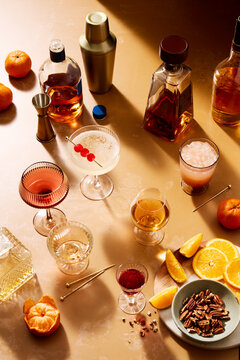 Scene of Warm Cocktails and Bottles in Warm Light