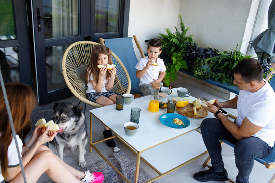 family spending time on the terrace
