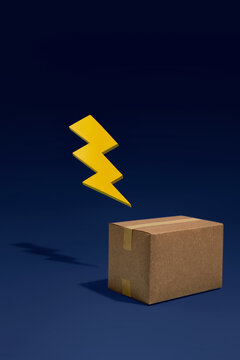 Yellow lightning bolt symbol hovering above a cardboard shipping