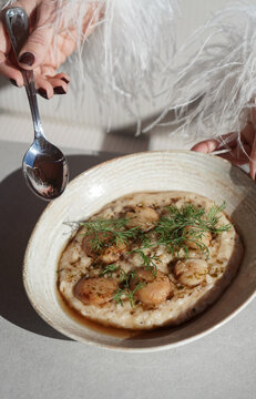 Woman eating ristotto