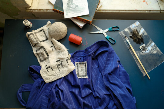 a blue kimono on the designer's desk