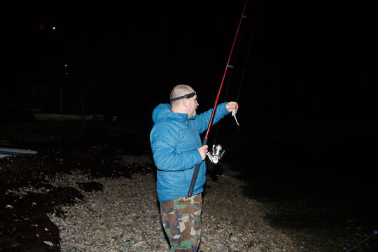 Angler checks the crab bait 