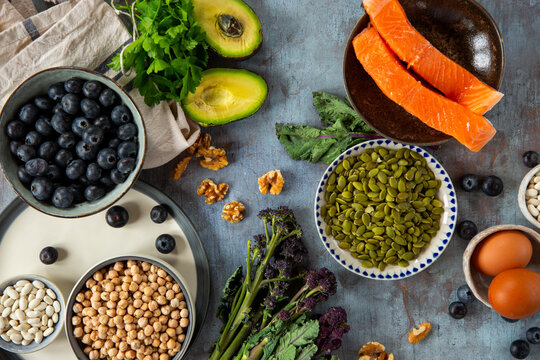 High nutrient foods, including salmon, nuts, seeds and legumes.