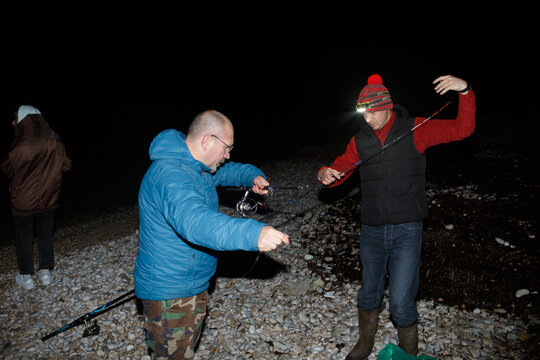 Fishermen prepare for night fishing