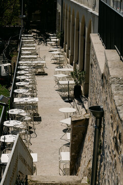 tables  and chairs in restaurant  in Lyon France, 