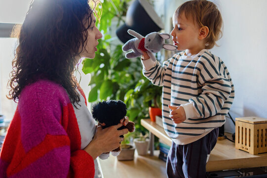 Mother Playing With Child at Home