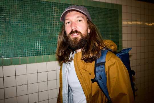 Man is walking through the subway station