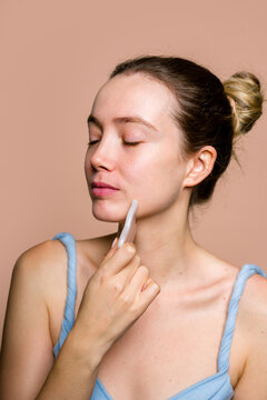 Woman Touching Chin