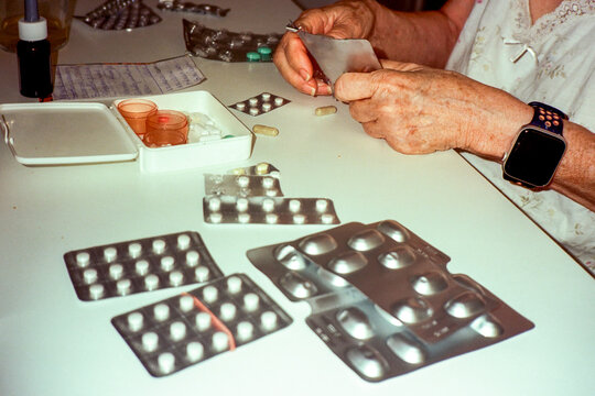 Senior Woman Sorting Pills