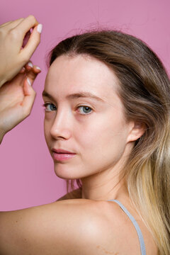 Woman Holding Hair Back