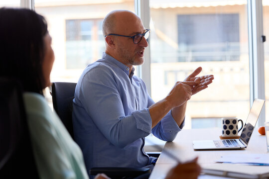 Senior manager speaks on a meeting