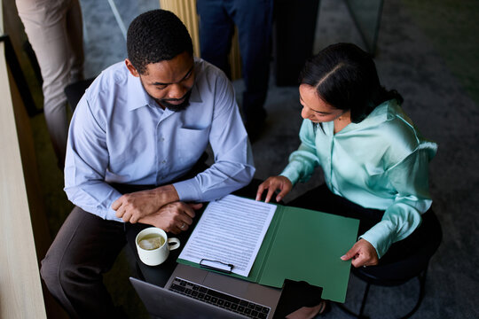 Colleagues reviewing paperwork