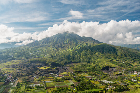 Volcanic mountain with farmland and villages in Bali