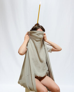 Woman with a candle on her head 6