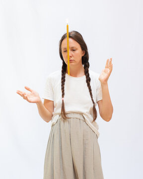 Woman with a candle on her face 2