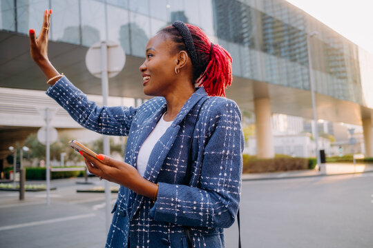 A woman using a mobile phone in the city