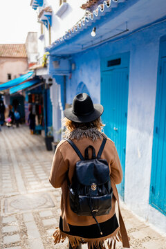 A woman travelling in a town in Morocco