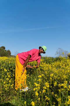 Man Standing Flower Field
