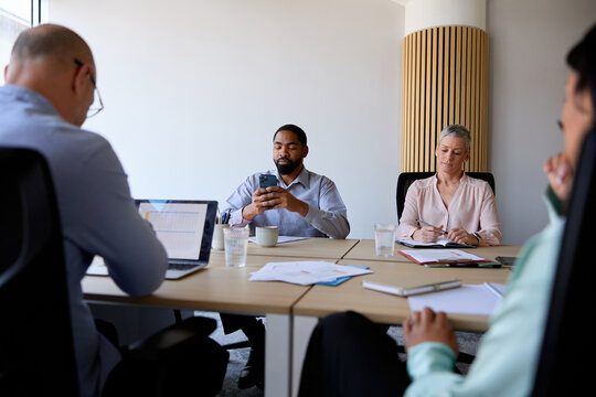 People sitting at the conference table