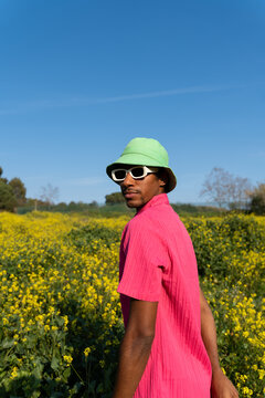 Man Standing Flower Field
