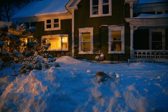 home covered in snow after a blizzard in massachusetts