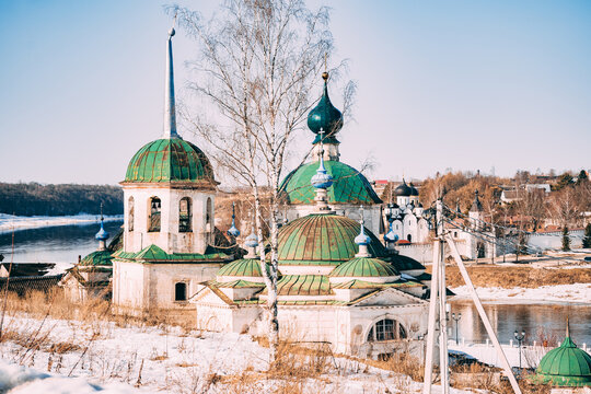 Historic buildings near a river in winter season
