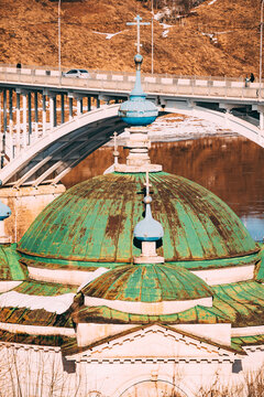 Dome with crosses and bridge behind in winter setting