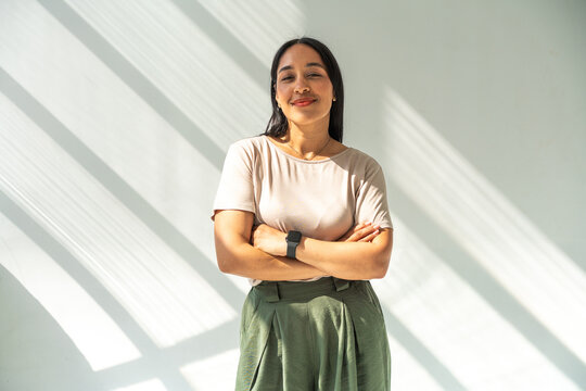 Confident Mixed Race Woman Portrait Standing With Arms Crossed 
