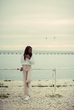Leaning by Waterfront Rail
