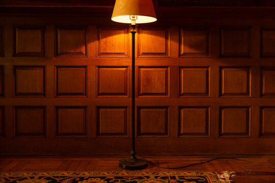 Single Lamp light on wood wall nobody